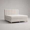 Ensemble lit double boxspring en tissu beige clair 160 x 200 cm avec matelas, surmatelas et tête de lit à panneaux verticaux